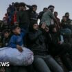 Huge crowds await return to north Gaza after delays