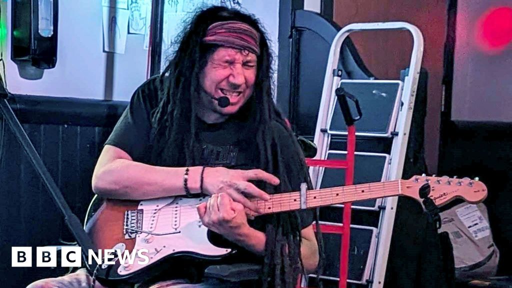 'I learned to play guitar with one arm after a stroke'