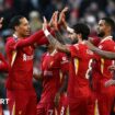 Liverpool players celebrate scoring against Ipswich