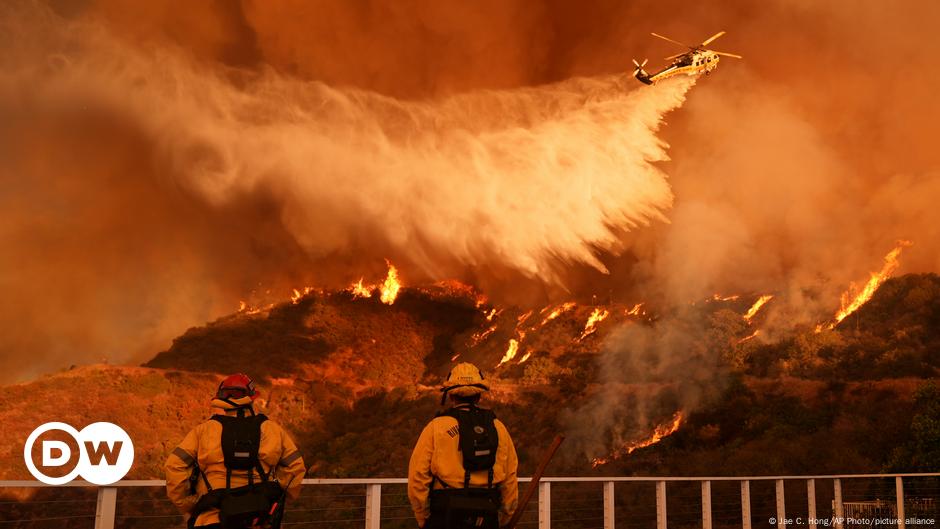 LA fires: Race to contain outbreaks with winds set to return