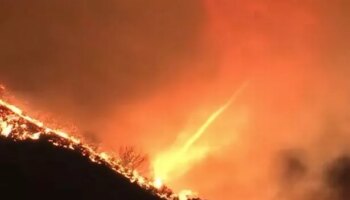 LA fires: Ultra rare 'fire tornado' caught on camera tearing towards leafy neighbourhood