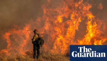 LA wildfires: stronger winds threaten further destruction, officials warn