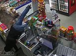 Moment bungling criminal tries to rob shop with toy gun while drunk - before falling over counter in bid to get vodka