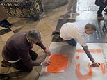 Moment two Just Stop Oil activists sprayed orange paint over Charles Darwin's marble headstone in Westminster Abbey in protest over 1.5C warming limit