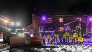 People still snowed in at Britain's highest pub receive booze delivery from Aldi snowplough