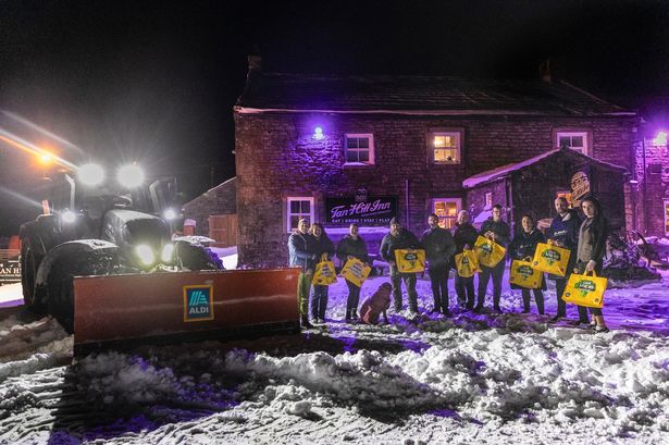 People still snowed in at Britain's highest pub receive booze delivery from Aldi snowplough