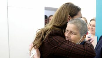 Princess Kate pictured in three touching moments as she meets fellow cancer patients