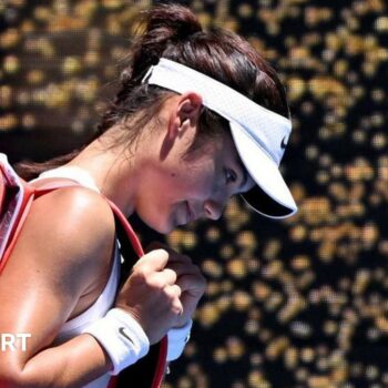 Emma Raducanu trudges off court after losing to Iga Swiatek at the Australian Open