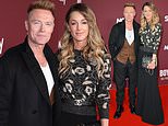 Ronan Keating is supported by his glamorous wife Storm as they attend the launch of warts-and-all Boyzone documentary No Matter What