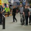 Shocking moment angry mob forces Queen Elizabeth hospital into lockdown 'threatening staff'