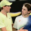 Jannik Sinner hugs Alex de Minaur after their Australian Open quarter-final