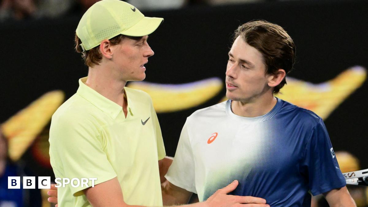 Jannik Sinner hugs Alex de Minaur after their Australian Open quarter-final