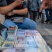 Toman or rial: Can currency reform stop inflation in Iran?