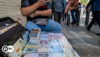 Toman or rial: Can currency reform stop inflation in Iran?