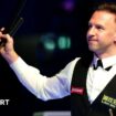 Judd Trump celebrates his quarter-final win at the Masters