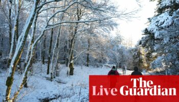 UK weather live: country braces for snow and freezing rain as temperatures fall