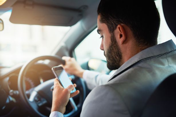 Using mobile phone at the wheel could become legal again - but it depends on the car