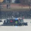 A Coast Guard vessel with a crane is pictured as it works near the wreckage of a Black Hawk helicopter in the Potomac River. Pic: AP Photo/Alex Brandon