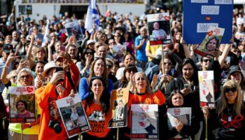 People watch from Tel Aviv amid the hostage return. Pic: Reuters