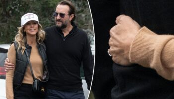 Kevin Costner's ex Christine Baumgartner flashes ring on outing with new fiancé