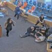 Video captures courtroom brawl as two men attack murder suspect during hearing