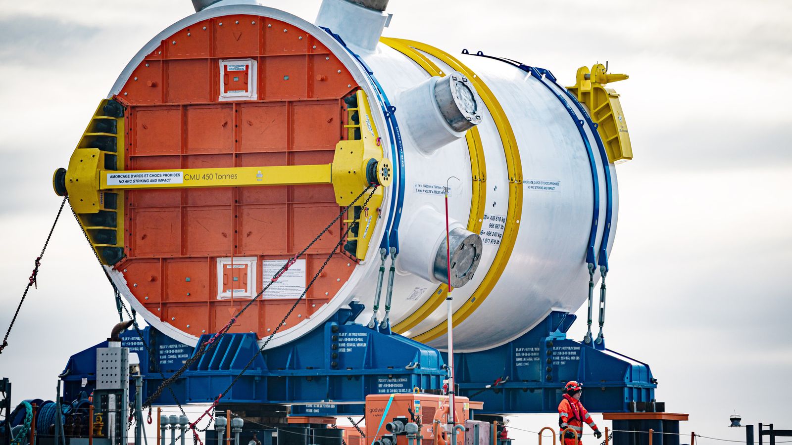 The first new nuclear reactor for a British power station for over 30 years arrives by barge at Combwich Wharf on the River Parrett, Somerset. Picture date: Friday February 24, 2023. Weighing 500-tonnes the reactor pressure vessel is where the nuclear fusion process will happen, creating the heat to make steam for the worlds largest turbines inside Hinkley Point C power station. Picture date: Friday February 24, 2023.