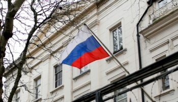 A Russian flag flies outside the Consular Section of the Russian Embassy in London, Tuesday, Feb. 22, 2022. British Prime Minister Boris Johnson says the U.K. will introduce "immediate" economic sanctions against Russia, and warned that President Vladimir Putin is bent on "a full-scale invasion of Ukraine." (AP Photo/David Cliff)