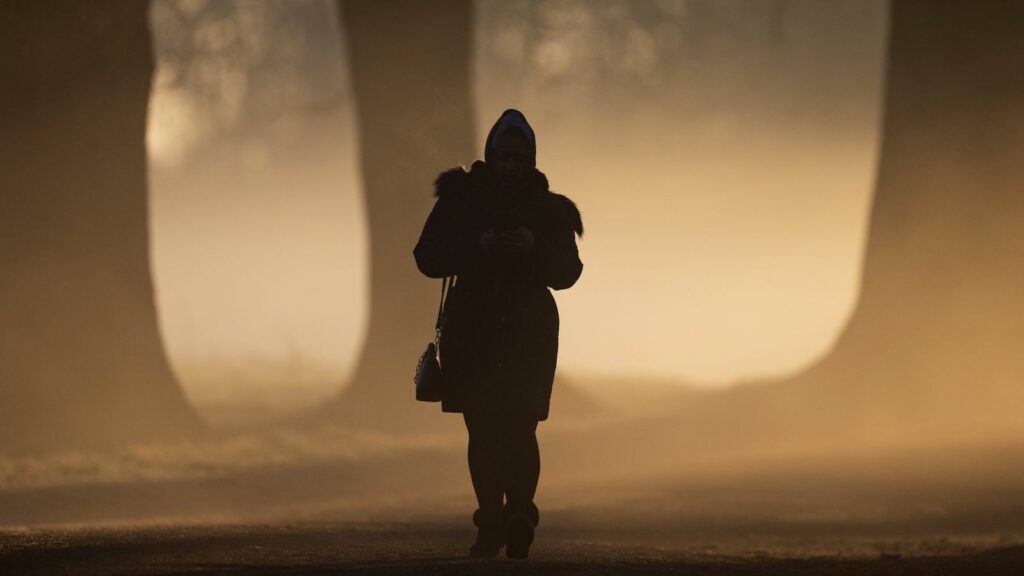 A person in the morning fog of Morden Hall Park, south London. Picture date: Thursday February 6, 2025.