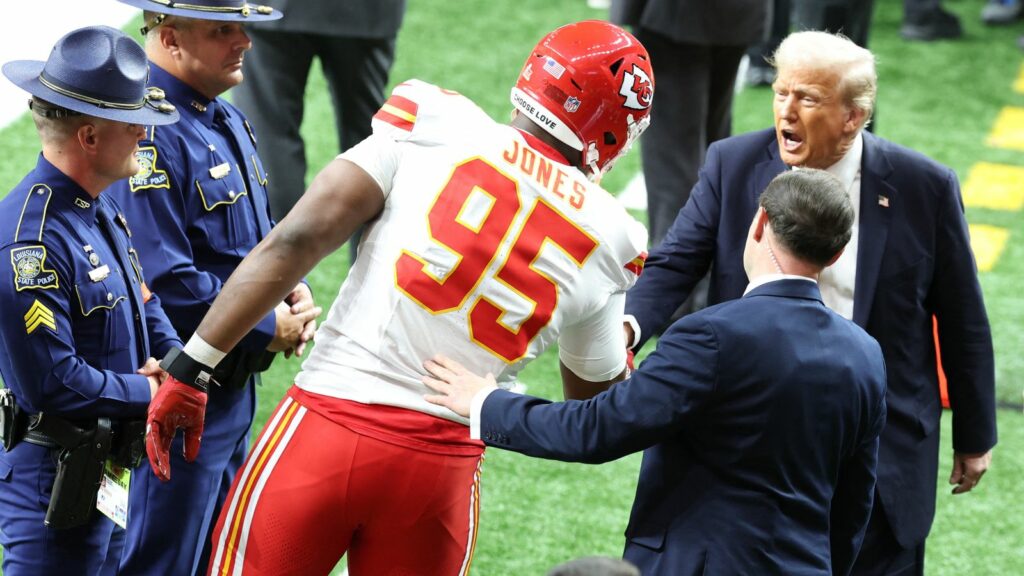 President Trump meets Chris Jones of the Kansas City Chiefs before the Super Bowl. Pic: Reuters