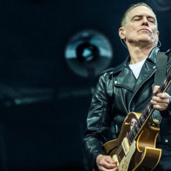 Canadian singer-songwriter and musician Bryan Adams performs at the Tinderbox music festival in Odense, Denmark, June 28, 2024. Ritzau Scanpix/Helle Arensbak via REUTERS ATTENTION EDITORS - THIS IMAGE WAS PROVIDED BY A THIRD PARTY. DENMARK OUT. NO COMMERCIAL OR EDITORIAL SALES IN DENMARK.