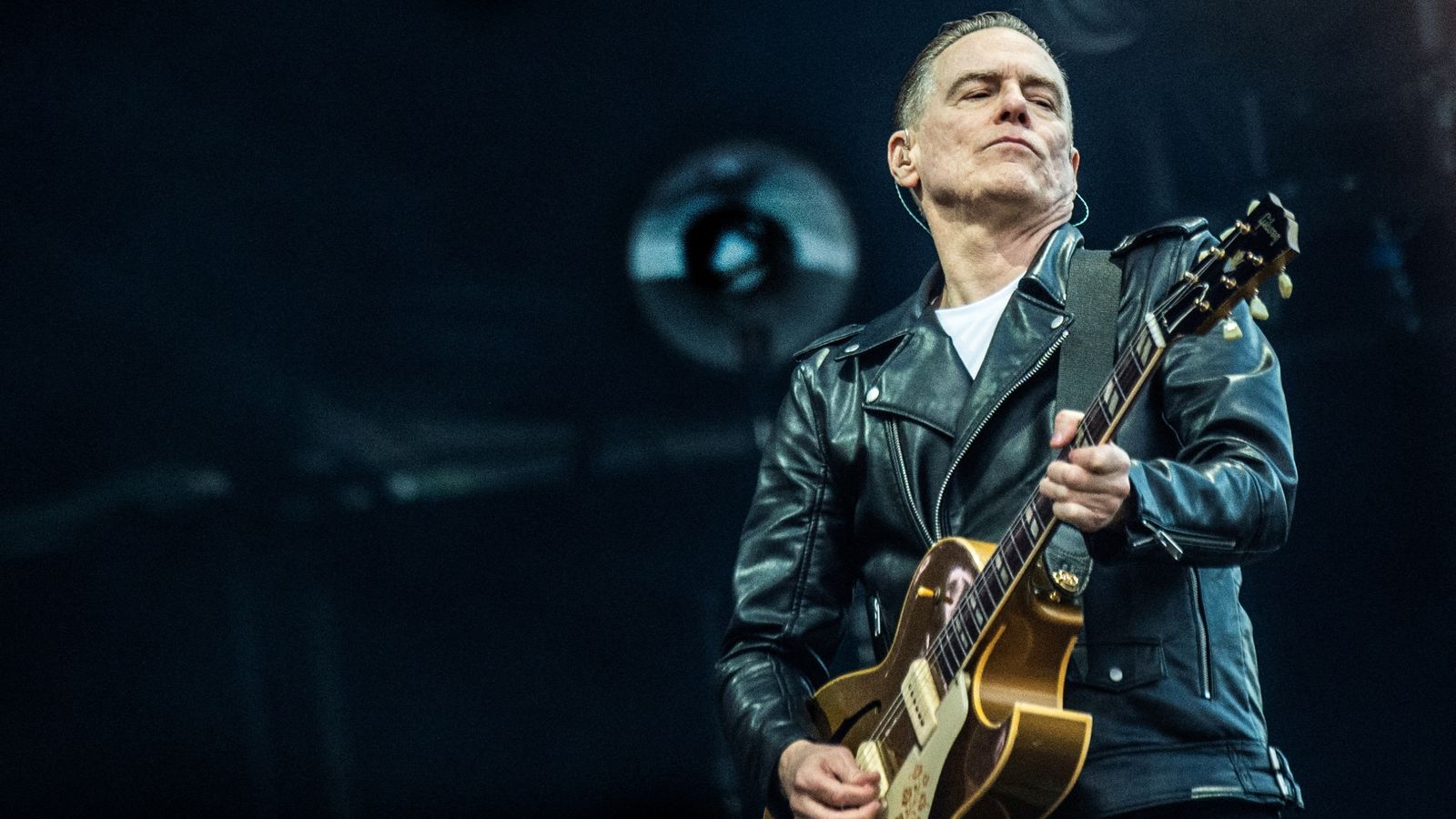 Canadian singer-songwriter and musician Bryan Adams performs at the Tinderbox music festival in Odense, Denmark, June 28, 2024. Ritzau Scanpix/Helle Arensbak via REUTERS ATTENTION EDITORS - THIS IMAGE WAS PROVIDED BY A THIRD PARTY. DENMARK OUT. NO COMMERCIAL OR EDITORIAL SALES IN DENMARK.