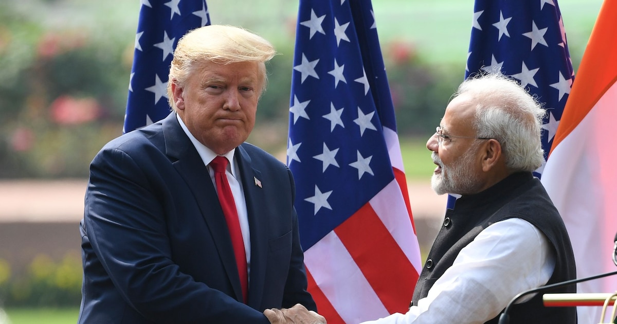 US President Donald Trump (L) shaeks hands with India's Prime Minister Narendra Modi listens during a joint press conference at Hyderabad House in New Delhi on February 25, 2020. (Photo by Prakash SINGH / AFP)