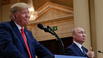 FILE - Russian President Vladimir Putin, right, and U.S. President Donald Trump give a joint news conference at the Presidential Palace in Helsinki, Finland, July 16, 2018. (AP Photo/Pablo Martinez Monsivais, File)