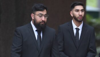 Brothers deny assaulting police officers at Manchester Airport