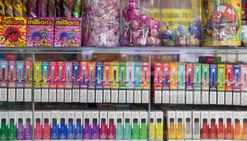 File photo dated 29/01/24 of disposable vapes of varying flavours on sale in a store close to Birmingham. Jacob King/PA Wire