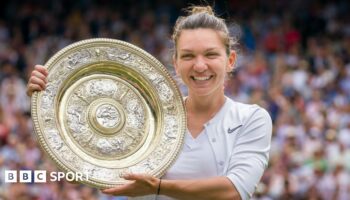 Simona Halep with the Wimbledon women's singles trophy in 2019