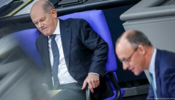 German election: Scholz floats legal case over racism claim