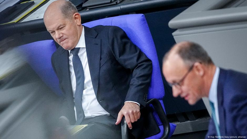 German election: Scholz floats legal case over racism claim