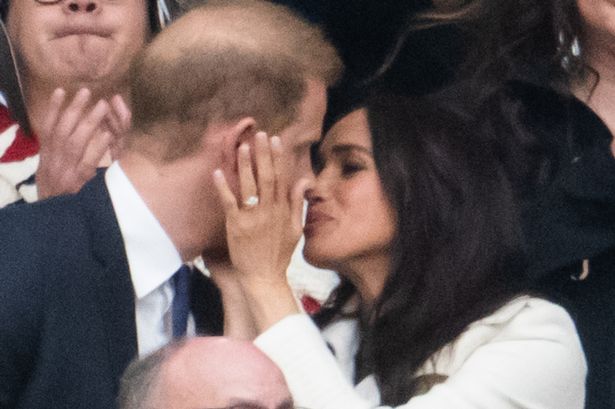 Lip reader reveals Prince Harry's cheeky five-word message to Meghan in loved-up display