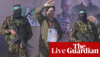 Middle East crisis live: Hamas release of more hostages under way