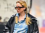 Pregnant Jennifer Lawrence looks far along in her pregnancy while in a lumberjack shirt as 'due date revealed'