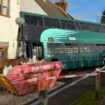 School bus horror as double decker crashes into side of house in UK village