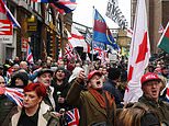 Tommy Robinson supporters start London march while their hero remains in prison as anti-racism protesters prepare for counter-demo